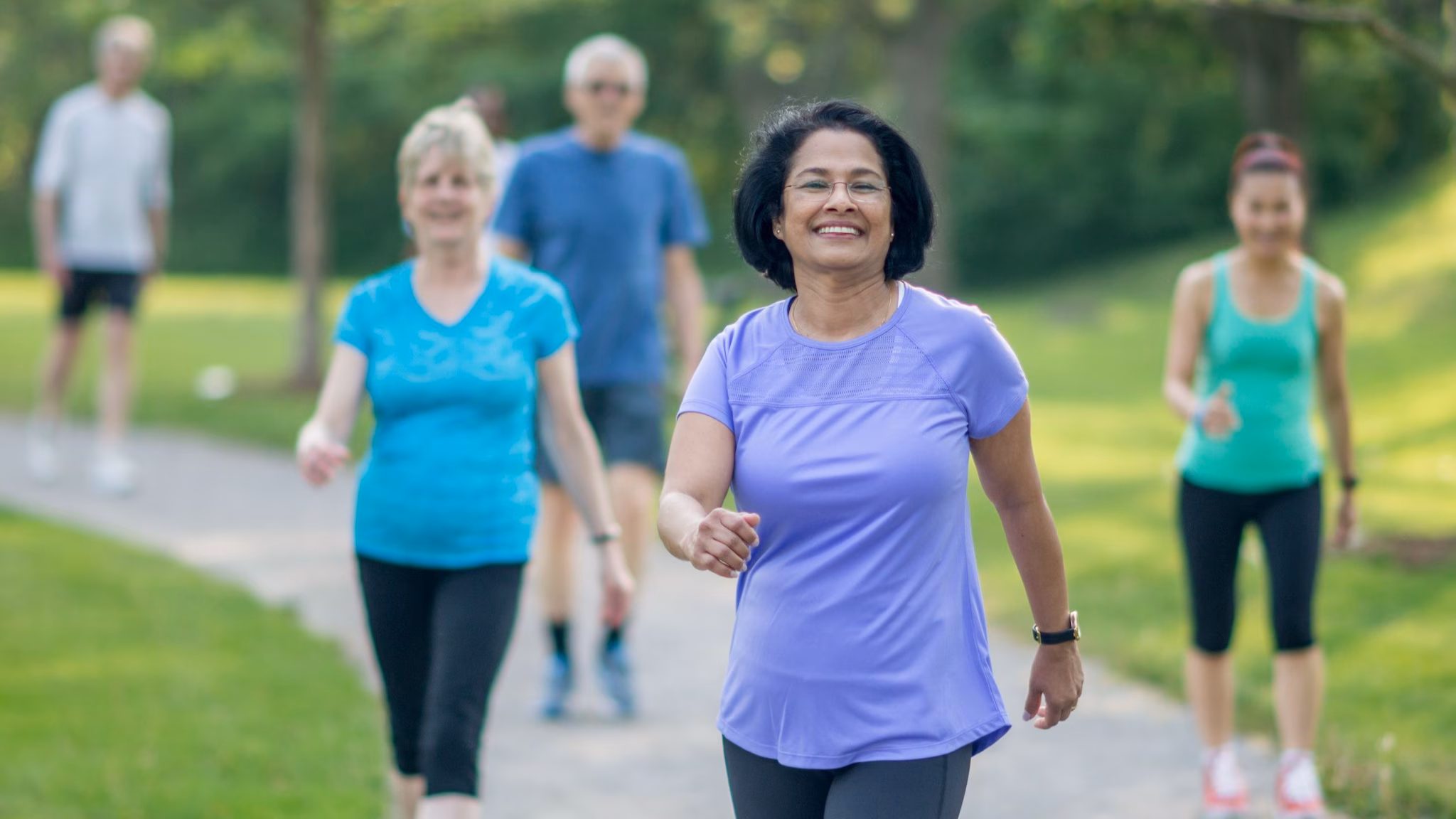 Group of people walking at the park