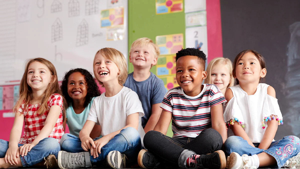 children sitting in a classroom children sitting in a classroom