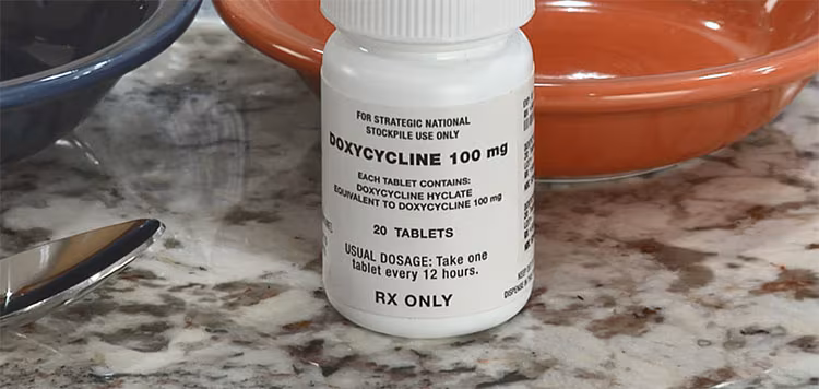 A bottle of medicine on a countertop