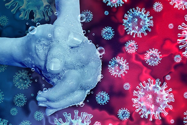 Hand being washed with a background of virus images Hand being washed with a background of virus images