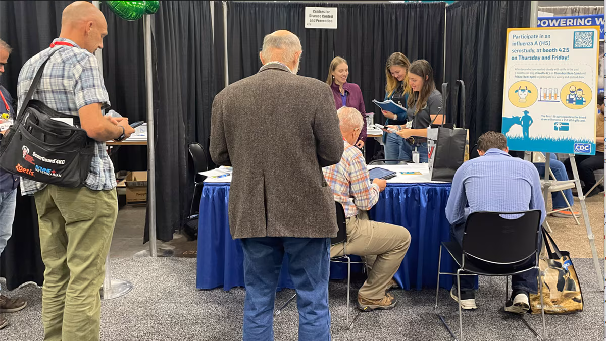 AABP conference attendees filling out survey. AABP conference attendees filling out survey.