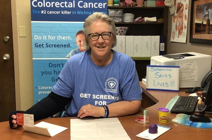 texas-voucher-program-karel-davis-700-sq Karel Davis, Program Director of the Wichita Falls-Wichita County Public Health District, holding a voucher