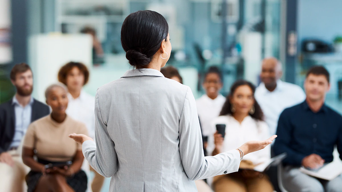 webcast-economic-evaluation Professionals learning on the job in a training class.