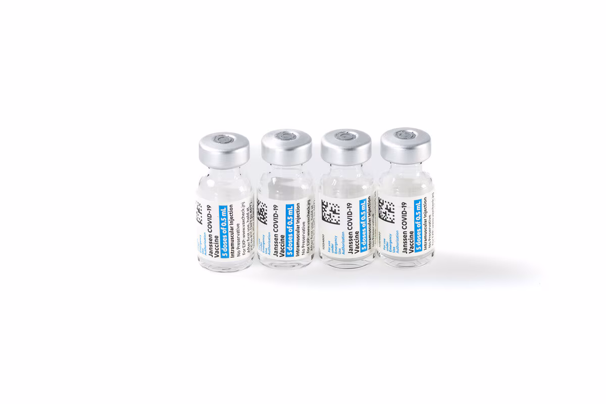 Vials of COVID-19 vaccine standing in a row.