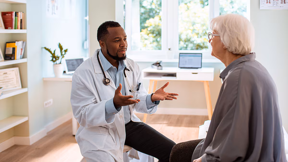 healthcare professional talking to patient