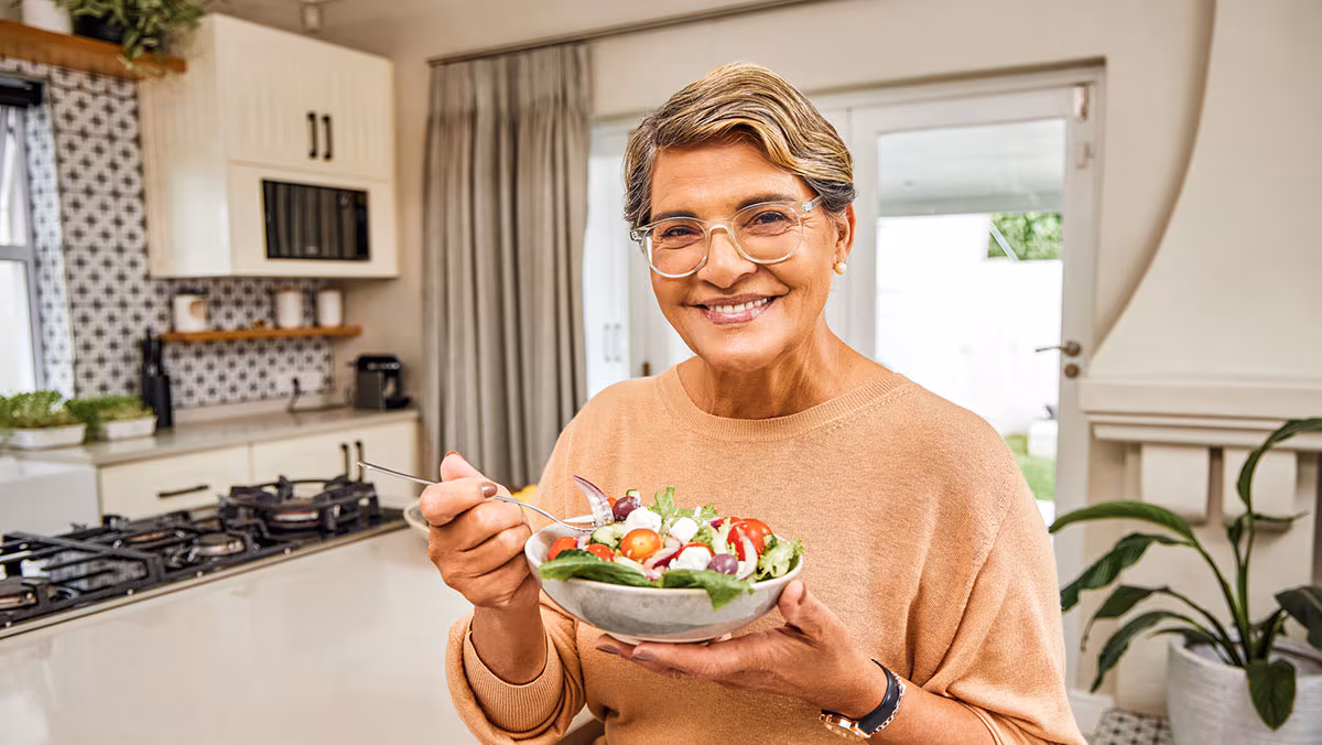 woman eating salad