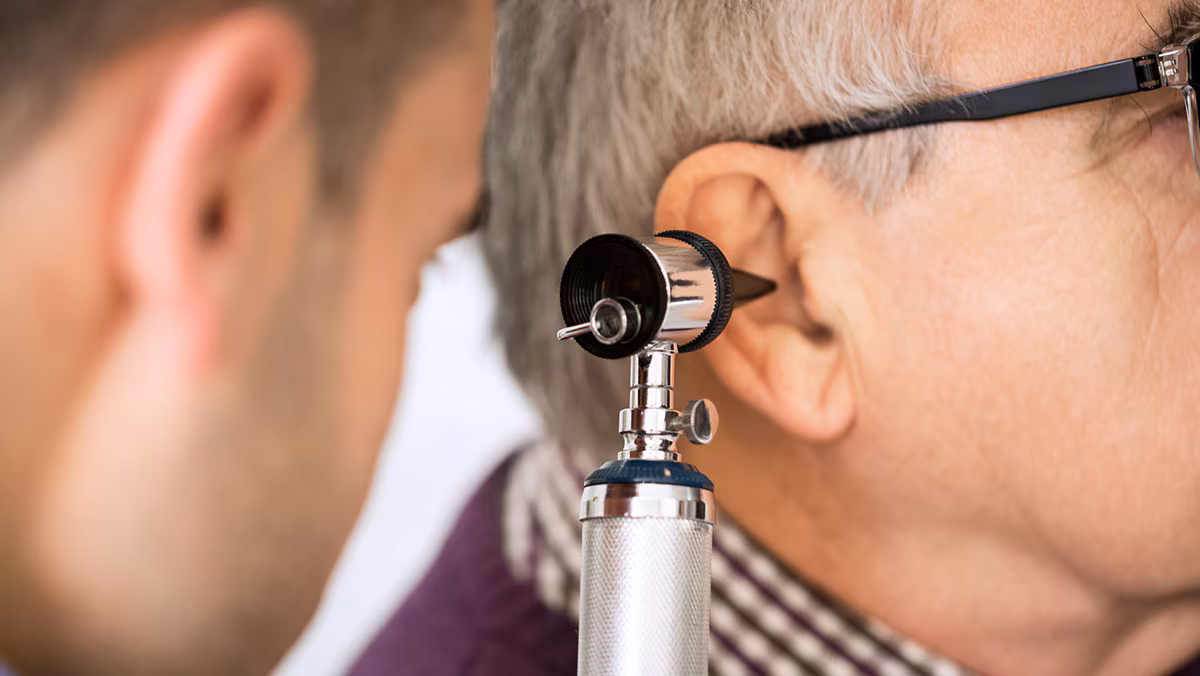 older patient getting a hearing check