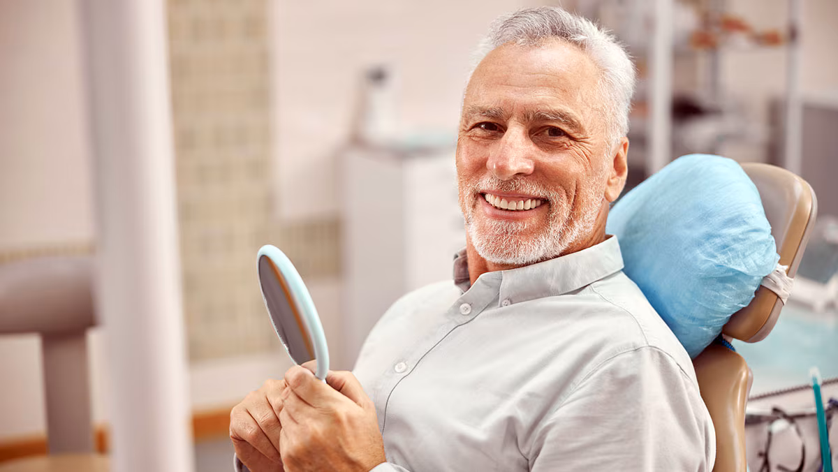 elderly man at the dentist