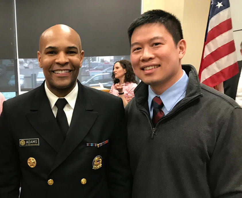 Alex Wu with U.S. Surgeon General Jerome M. Adams in 2019.