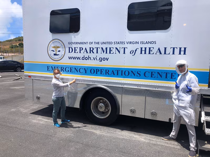 usvi-eoc-browne-greene EIS Officer and supervisor get ready in front of a mobile Emergency Operations Center in the U.S. Virgin Islands.