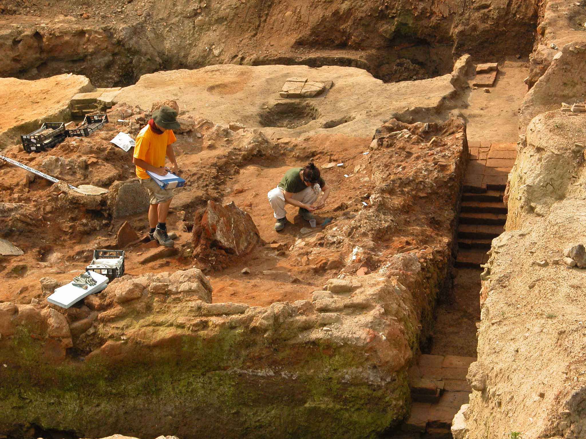 Blastomycosis Risk (2) - Image Image of a yellow-colored rocky terrain with two men digging within it.
