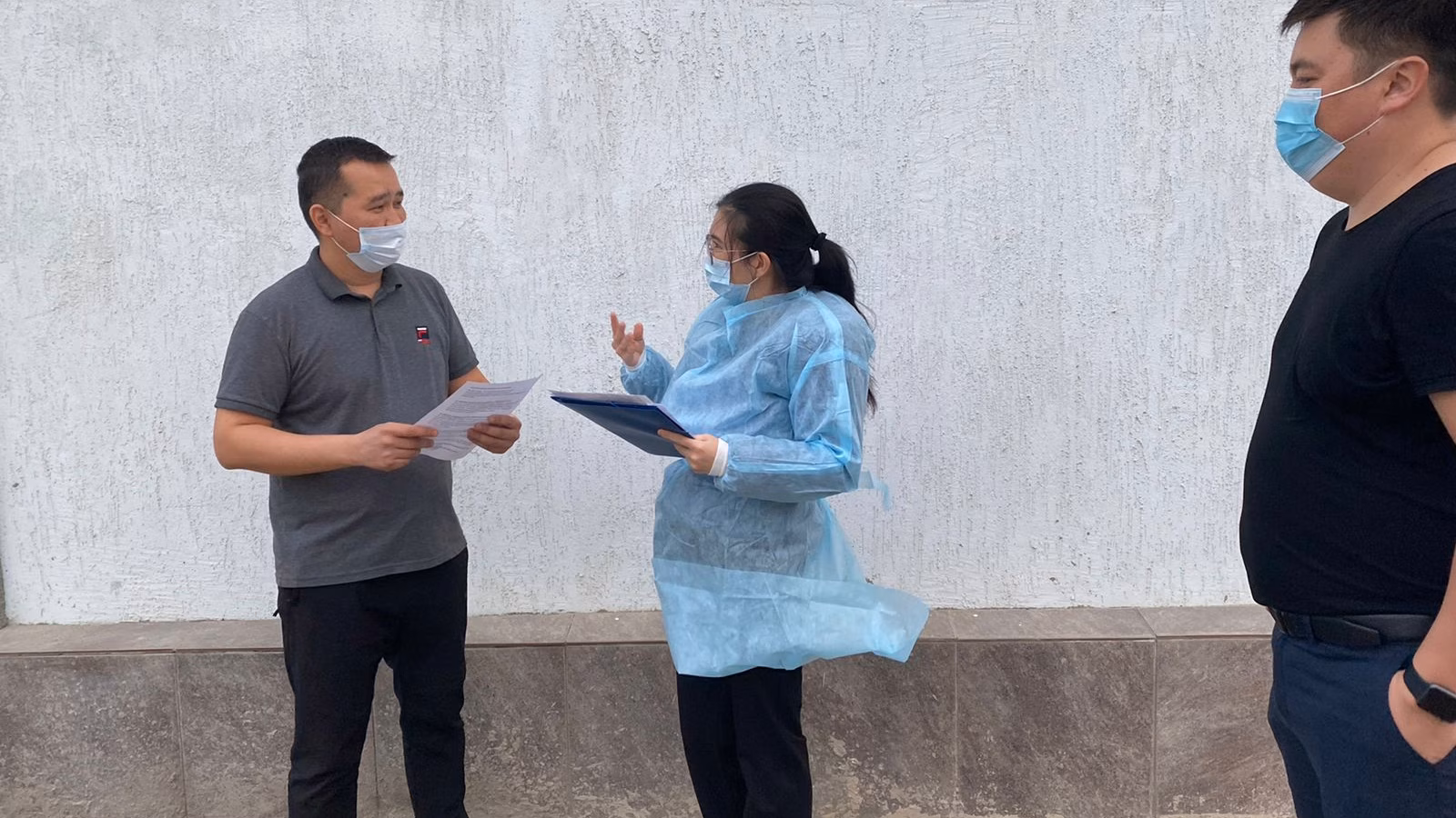 Dr. Taubayeva interviews a worker from a control group