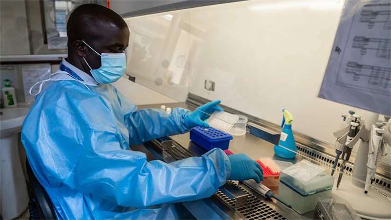 CDC supports Kenya’s COVID-19 surveillance and response_004 man testing in lab