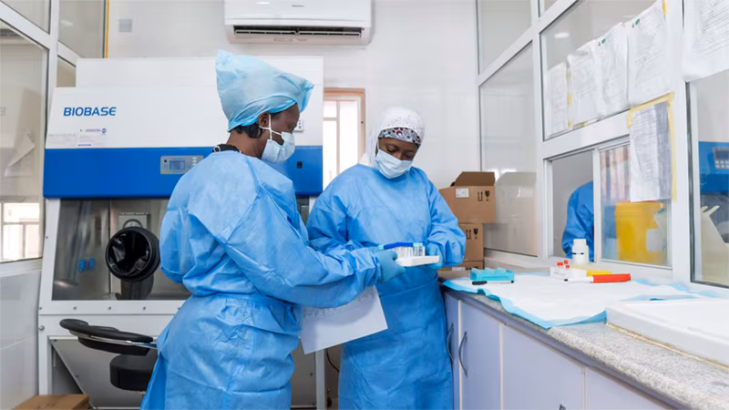 CDC and Nigeria Partner to Respond to COVID-19_007 Two people testing COVID-19 samples