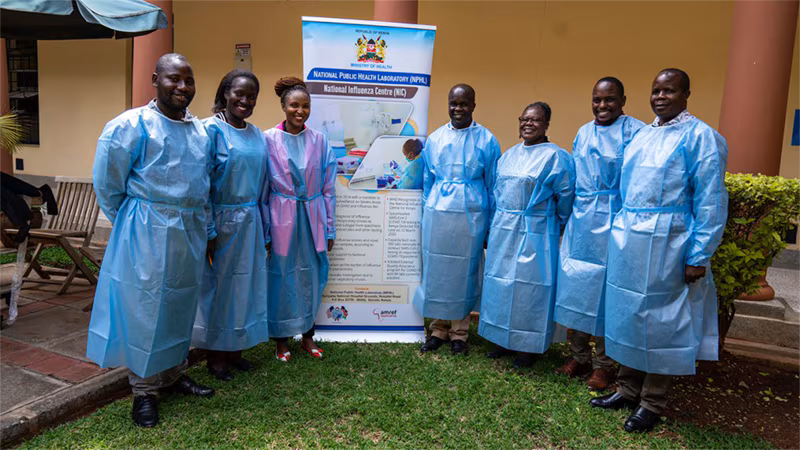 photo of a group of people outside a laboratory