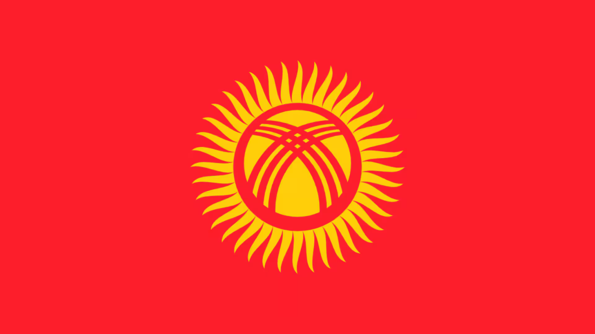 Kyrgyzstan flag is red with a gold sun in the center.