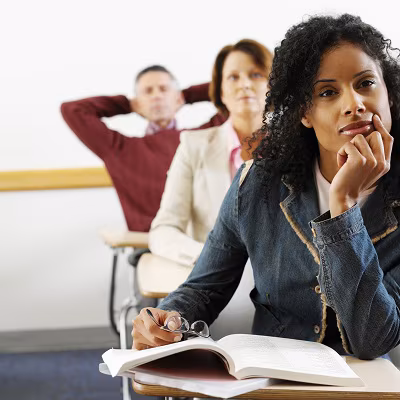 Adults learning about health in an adult education classroom.