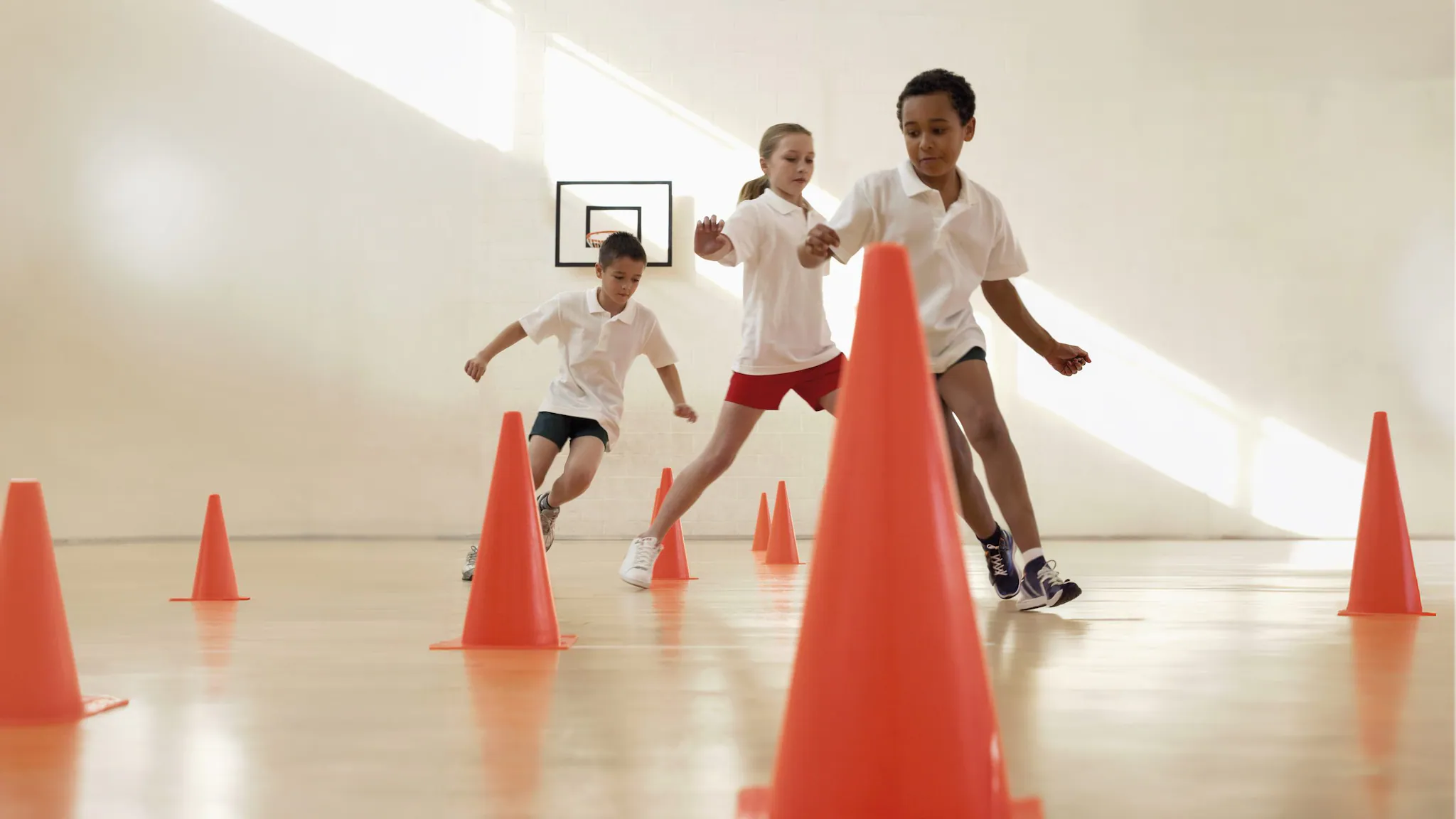 students at school doing a relay race