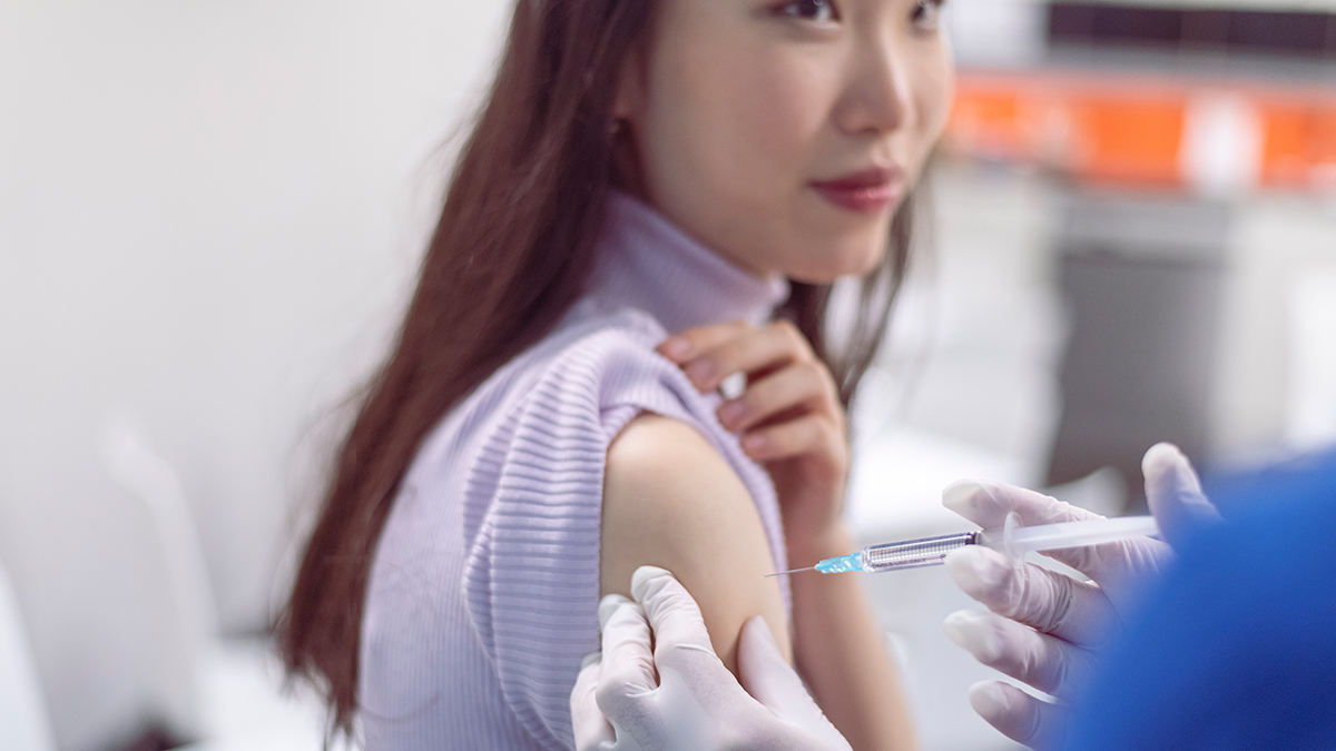 Hepatitis B Vaccine Administration Thumbnail A doctor placing a vaccine in a patient's shoulder