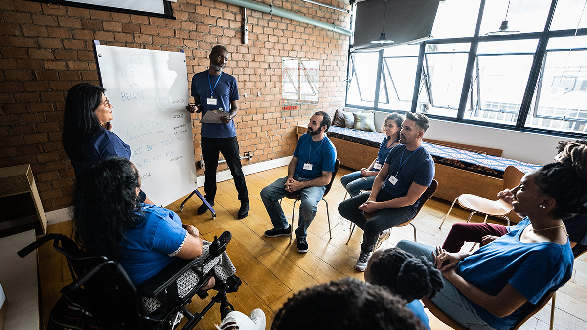 Hepatitis Education, Awareness, and Capacity Building for Communities and Providers Healthcare educator leading community meeting around hepatitis awareness and education