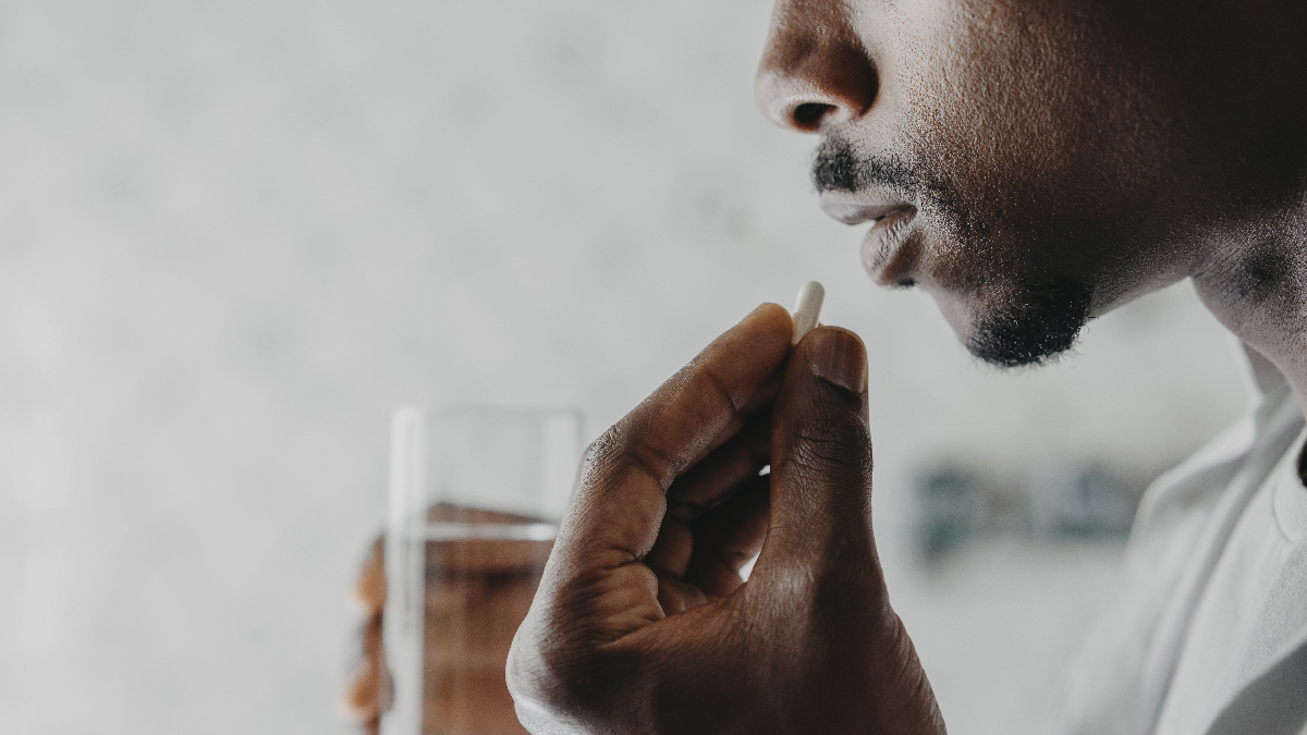 PEP Man taking pill.