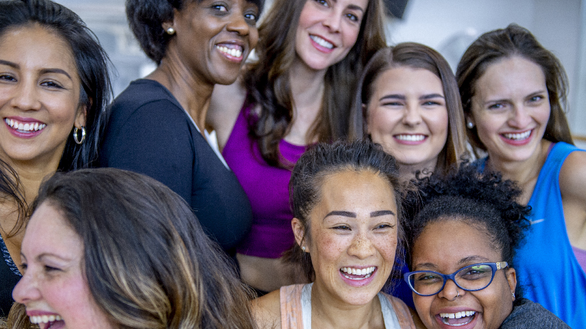 Group of women smiling.