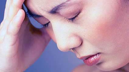 A woman with a headache