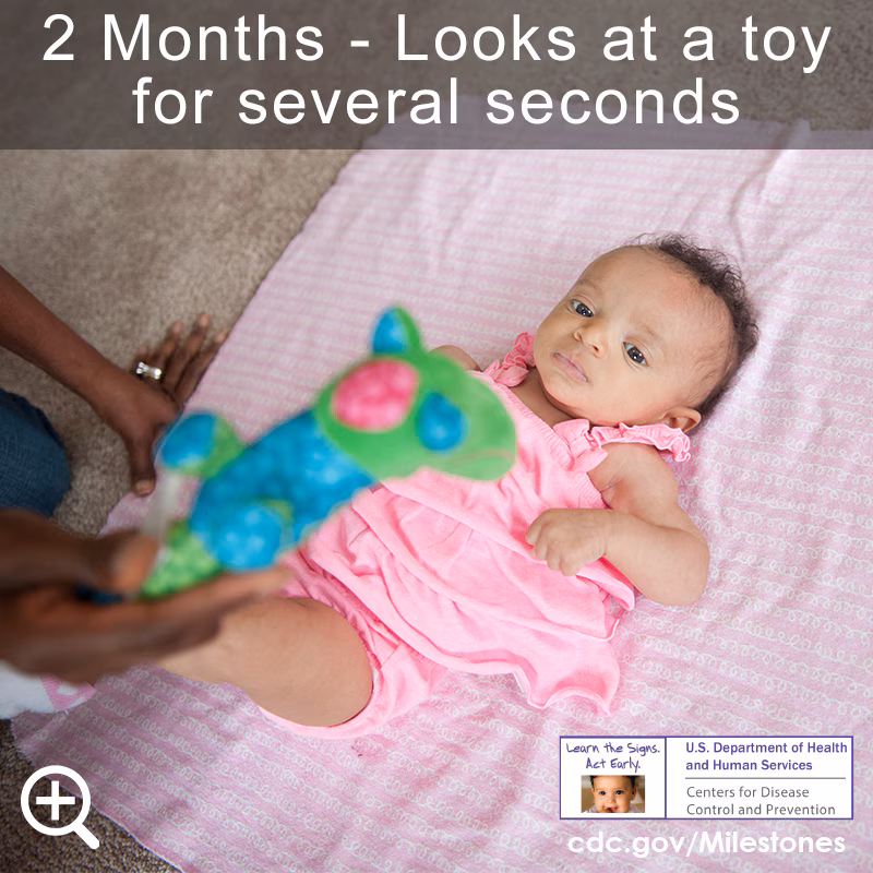 Begins to follow things with eyes