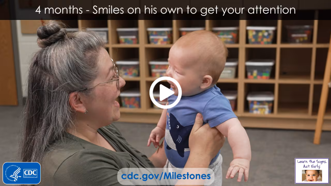 Smiles on his own to get your attention