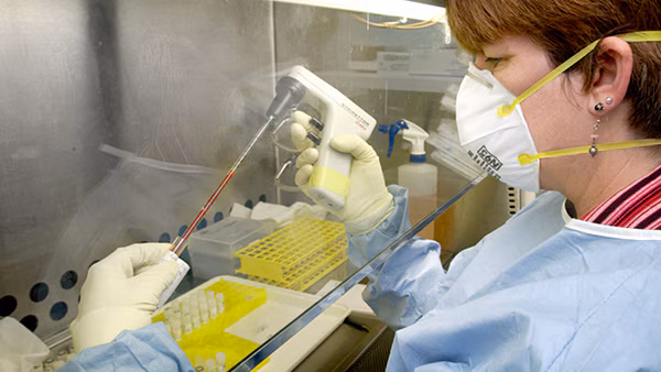 Lab worker conducting experiment