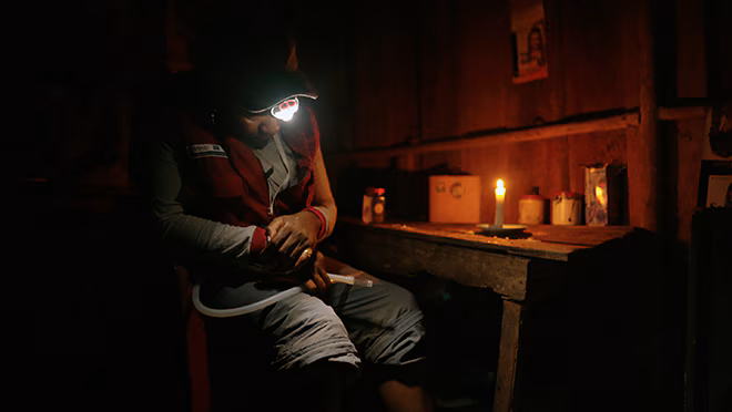 Local staff working late at night to capture mosquitoes.