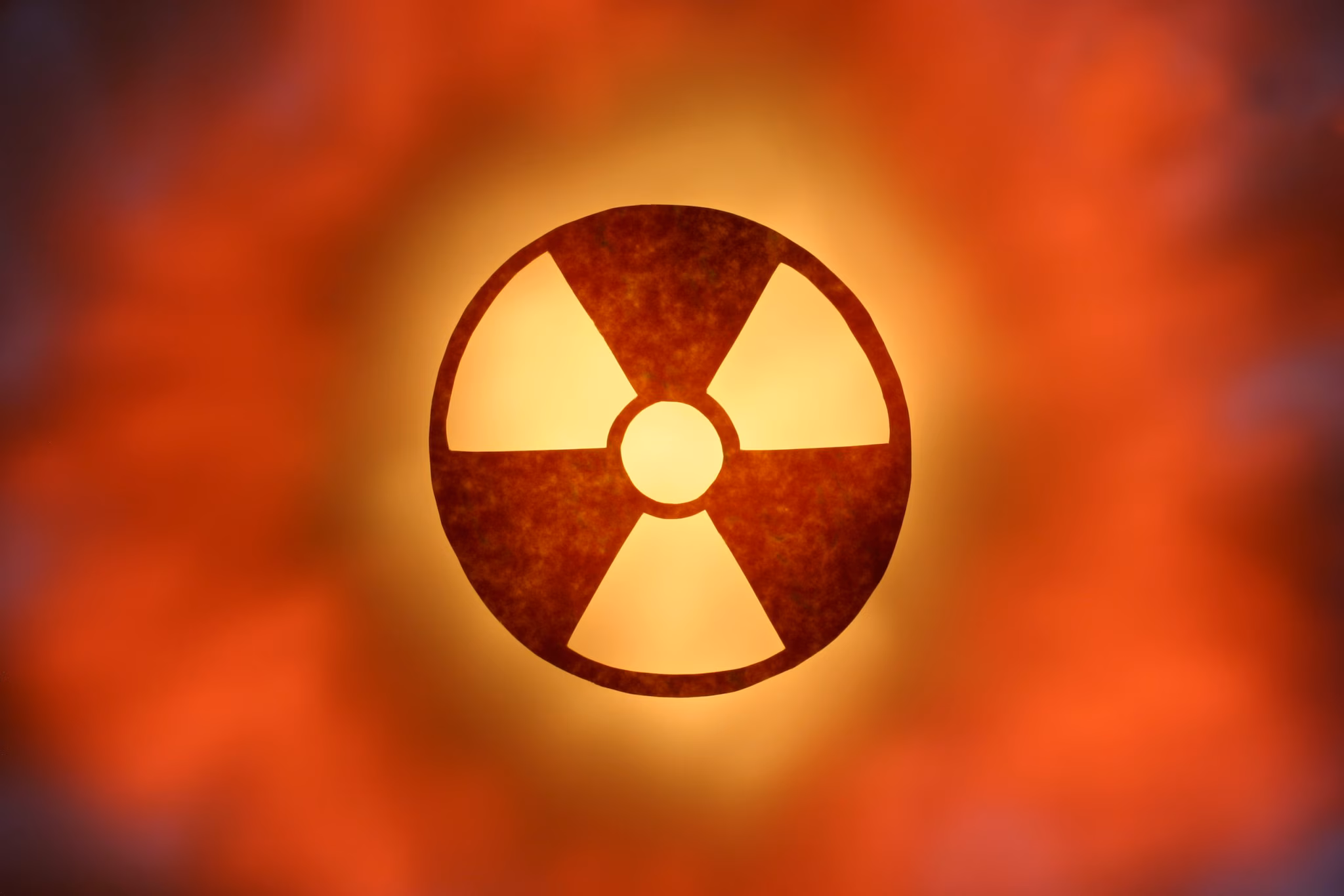 Glowing Radioactive Symbol image 209 KB Red-orange colored glowing radioactive symbol