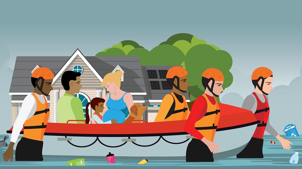 rescue boat Family being rescued in a small boat by responders walking through floodwaters.