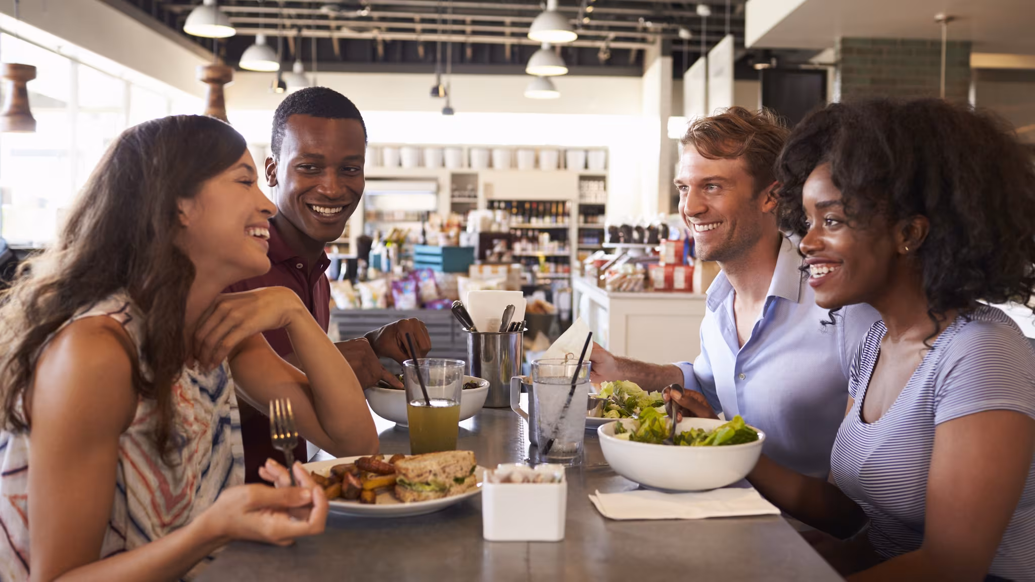 4 friends at a restaurant