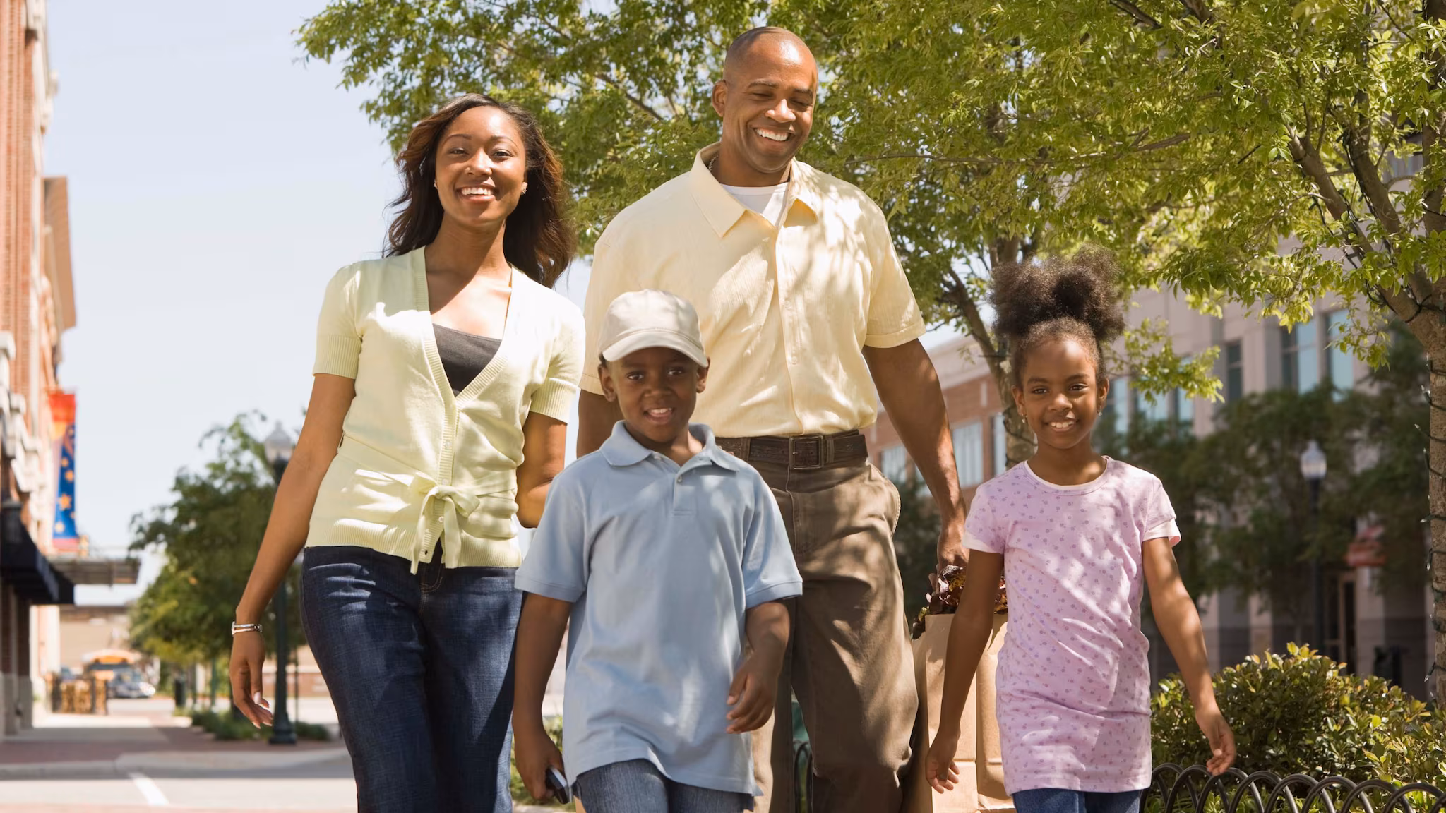 Family Walking Outdoors in the City