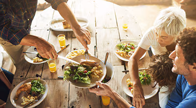 family-eating-514717426 family eating outside