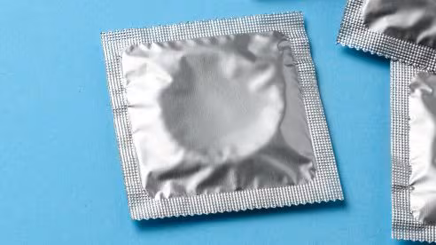 silver condom photo of condom