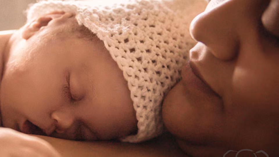 A mom holding stillborn infant mom holding stillborn infant