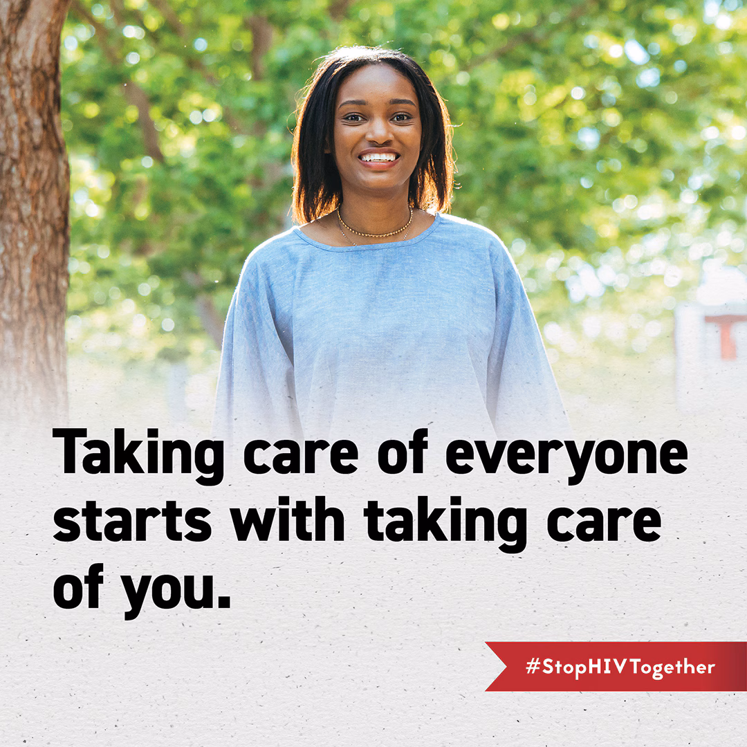 Image of you black women walking outside in front of trees