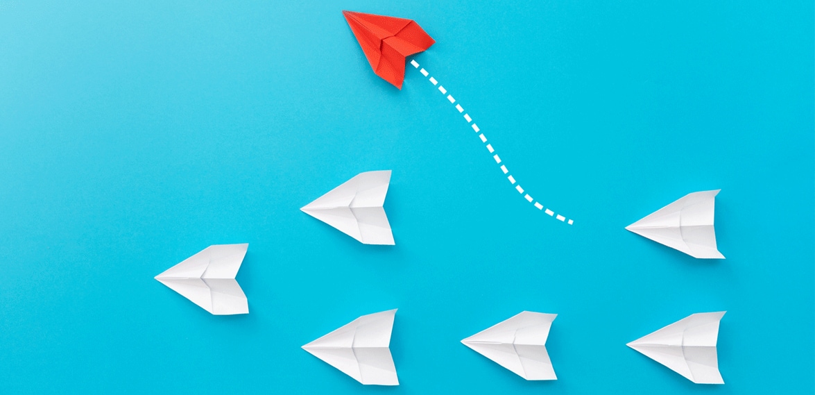 Change-direction-GI-1247180940 a paper airplane changing direction