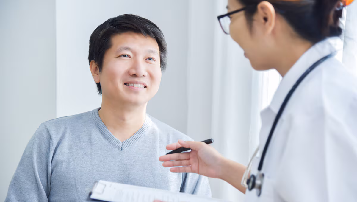 Patient talking with health care provider