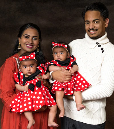 navdeep400px.jpg Navdeep Singh, his wife, and two daughters.