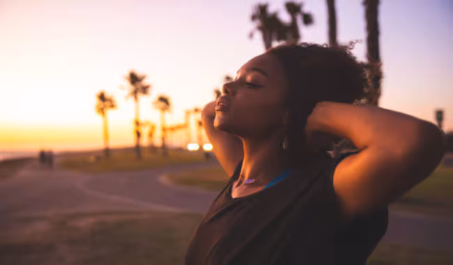 image.png Woman relaxing by taking deep breath.