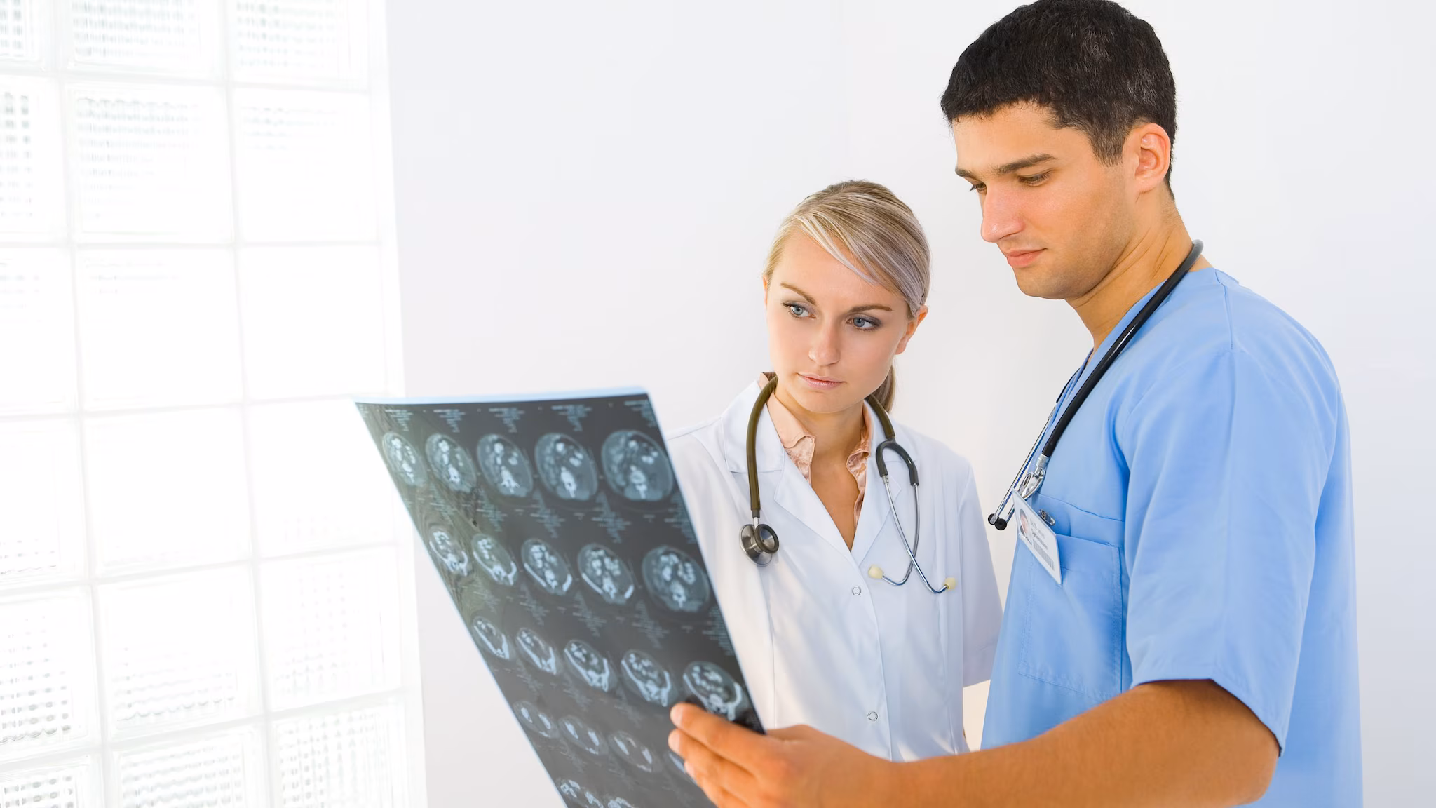 Doctors looking at the results of a brain scan