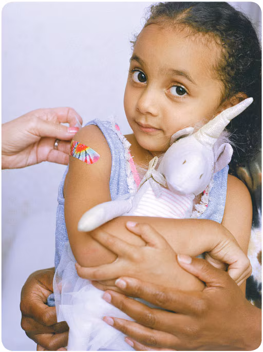 Girl holding a stuffed animal