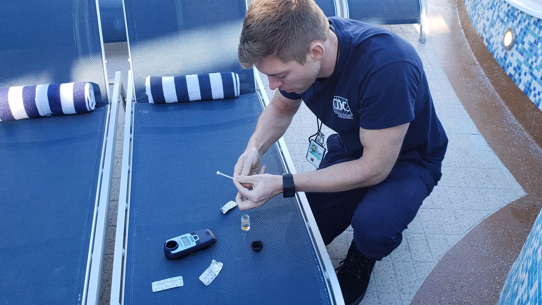 About Vessel Sanitation Program VSP inspector testing a sample of pool water.