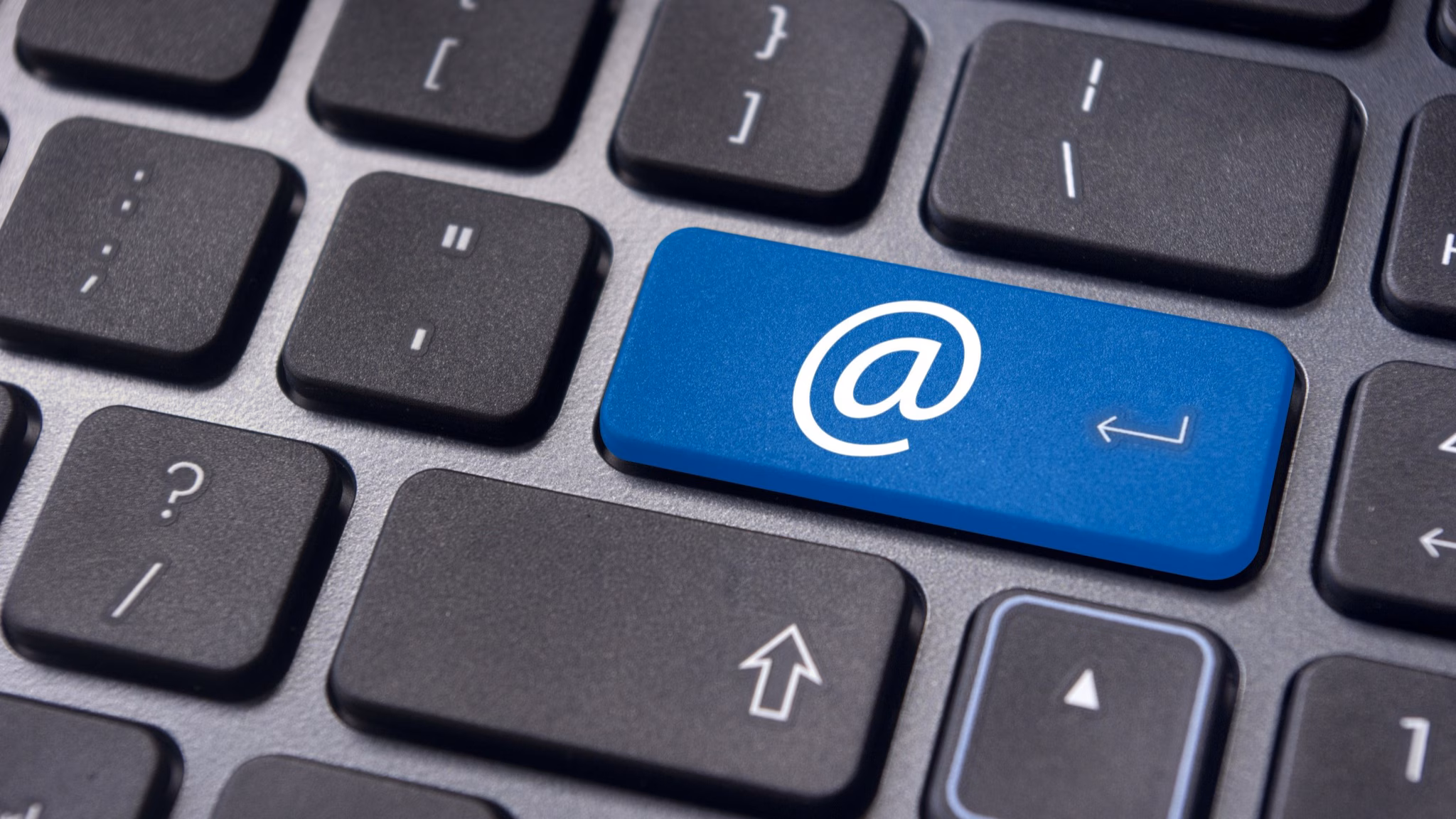 computer keys with the @ key highlighted