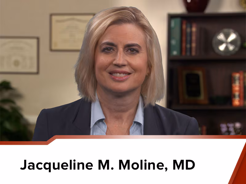 Dr. Jacqueline M. Moline MD facing the camera in an office environment